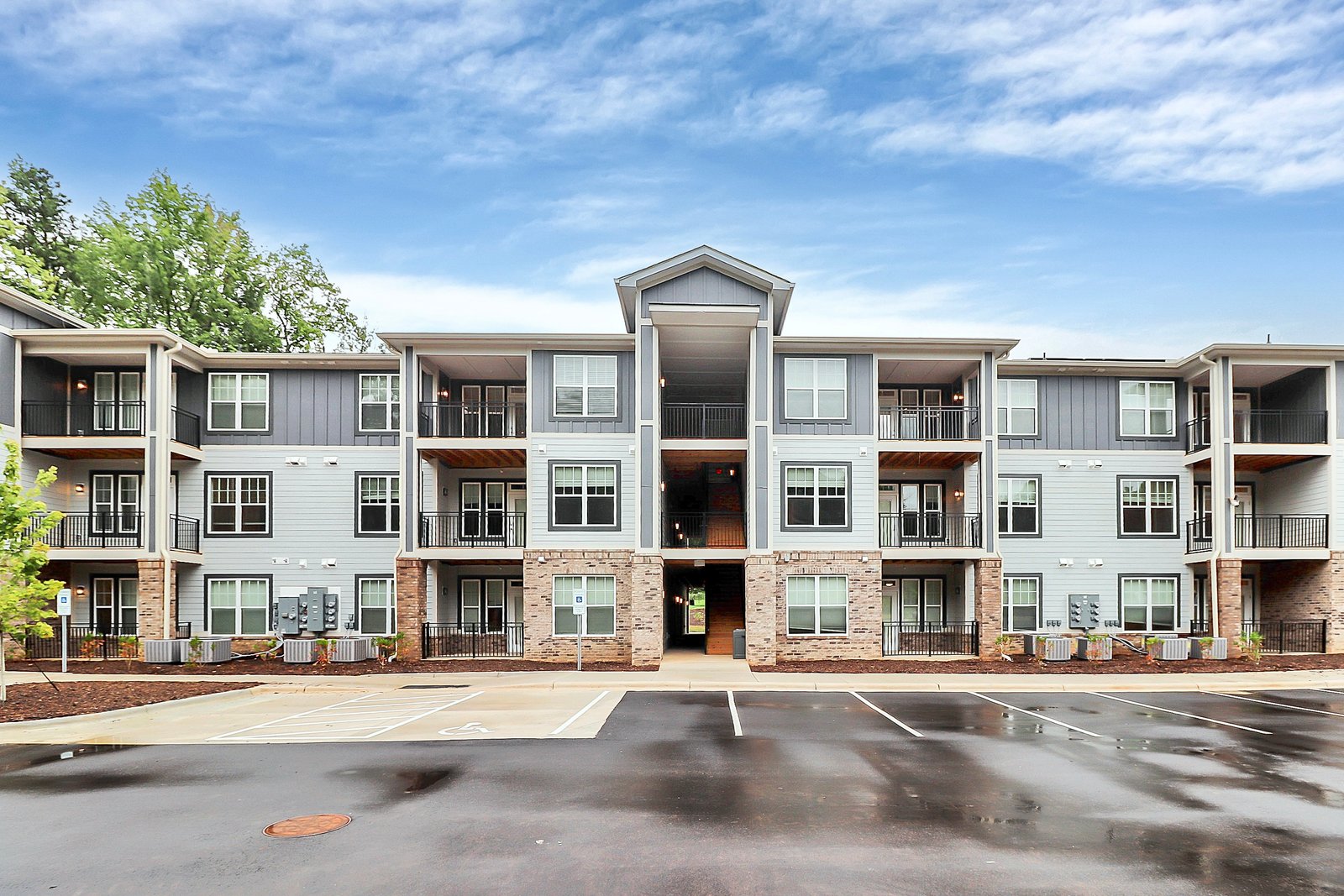 Exterior view of the completed 520 Tom Hunter Road apartment building